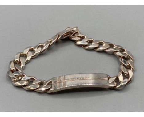 Gents silver ID bracelet complete with trigger catch 53.7g