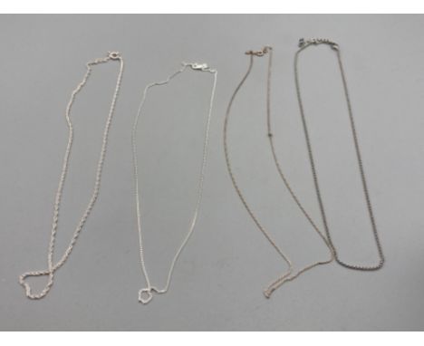 Three silver chains 5.9g and an 18k white gold plated chain
