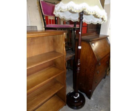 A standard lamp with shade