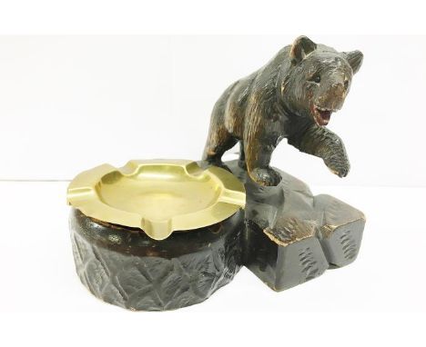 A Black Forest carved bear ashtray