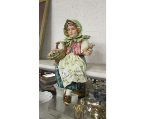 A large 19th century majollica shelf girl