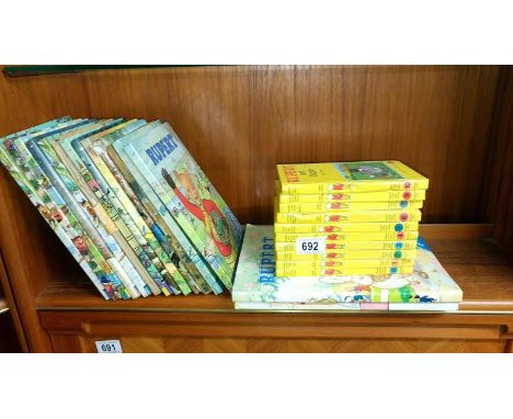 A collection of Rupert annuals and volumes 1 - 10 of the  Rupert The Little Bear Library