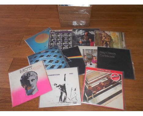 A box of approximately 60 progressive and classic rock LP records including Jimi Hendrix, Beatles, Pink Floyd, Jethro Tull, S