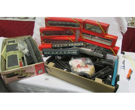 A boxed Hornby 00 R.350 Mallard, R.855 Flying scotsman together with rolling stock, transformer and Jouef station