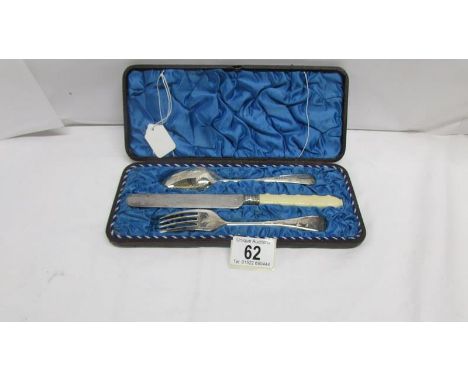 A Victorian cases Christening set comprising knife, fork and spoon