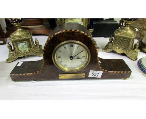 An inlaid mantel clock
