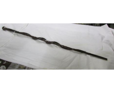 A carved walking stick with entwines snake A/F