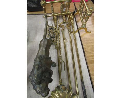 Set of three brass fire irons with turned finials L68cm, a pair of early 19th C brass fire implement rests, a brass toasting 