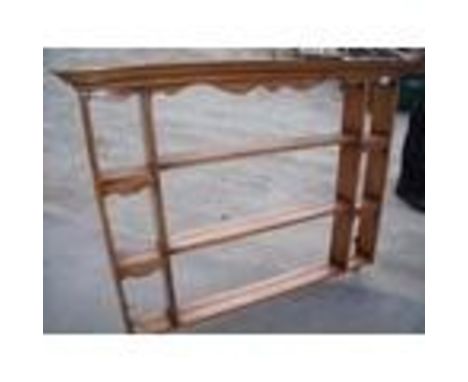 Stained pine three tier wall shelf,  W132cm 