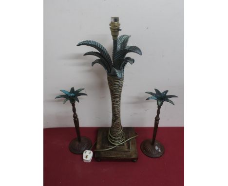 Metal table lamp in the form of a palm tree on stepped base and a pair of similar candle sticks 