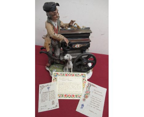 Capodimonte porcelain model of an organ grinder, on shaped base, with certificates H30cm 