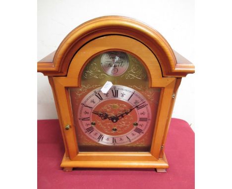 20th C mahogany finish Georgian style bracket clock, brass break arch dial with silvered chapter, retailed by Rapport London,