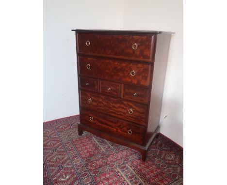 Stag Minstrel chest of various drawers, brass handles and bracket feet W82cm D47cm H112cm