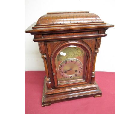 Early 20th C mahogany cased mantel clock, architectural case with engraved arched brass dial and silvered chapter, enclosed b