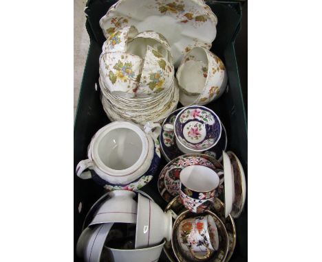 Victorian part tea service decorated with foliage on a white ground a Staffordshire Imari pattern part tea service, a Crown D