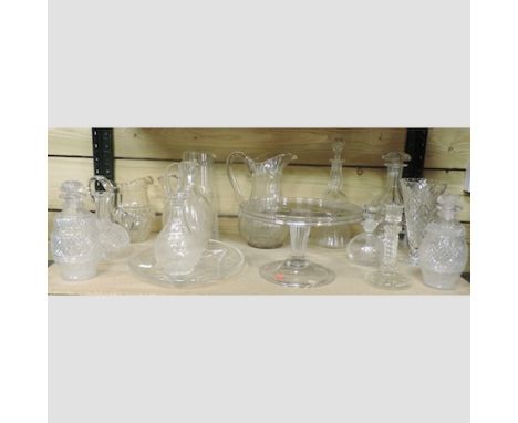 A shelf of mainly 19th century glassware, to include a tazza and decanters, tallest 31cm tall