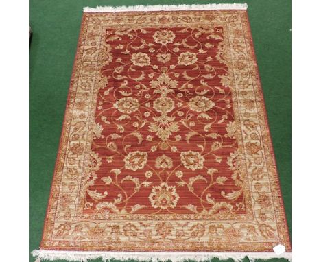 A Ziegler carpet, on a red ground, 230 x 160cm