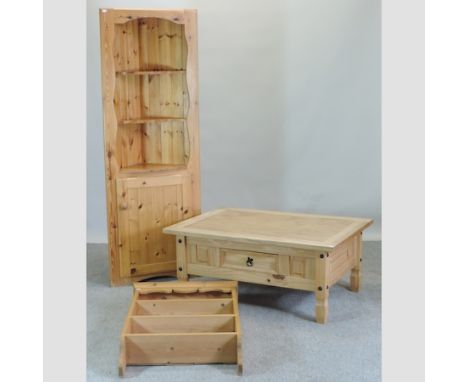 A modern pine corner cabinet, together with a pine hanging shelf and a coffee table, 107cm