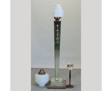 An Art Deco mirrored standard lamp, 174cm tall, together with an Art Deco opaque white glass shade, and a table lamp