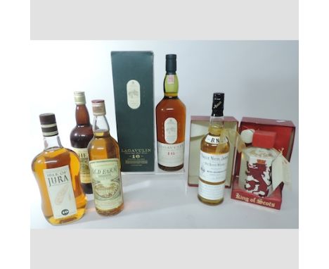 A bottle of Lagavulin single islay malt whisky, aged sixteen years, together with King of Scots presented in an iron stone de