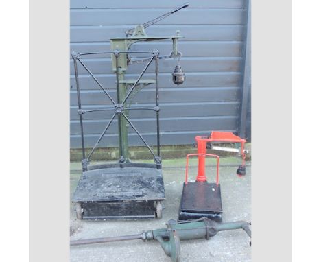 A large set of agricultural scales, 125cm tall, together with another smaller and an oil pump