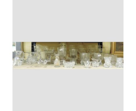 A shelf of mainly 19th century glassware, to include a glass rinser and salts 