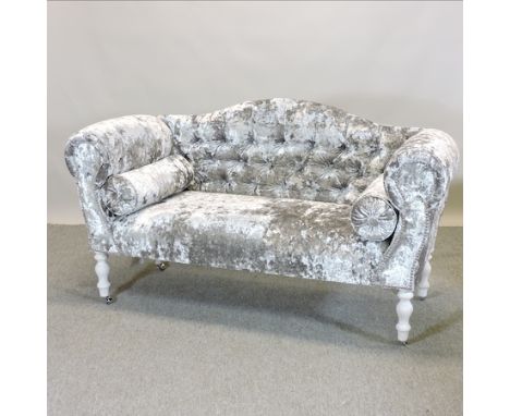 A crushed velvet upholstered sofa, on white painted legs, 140cm