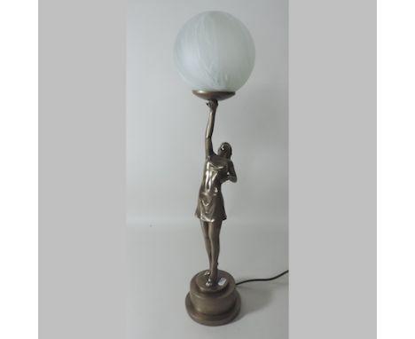 An Art Deco style figural table lamp, with an opaque white glass shade, 66cm