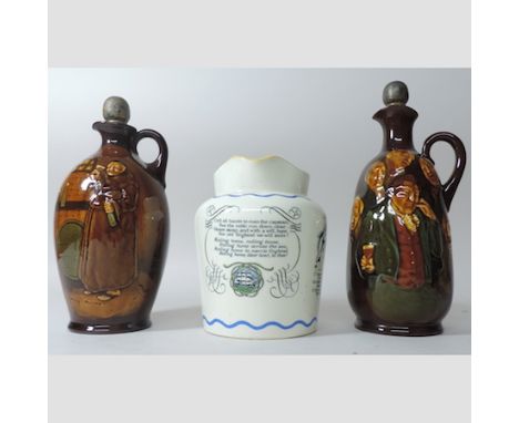 A Royal Doulton Kingsware flask, inscribed Memories, with stopper, 26cm tall overall, together with another, and a Royal Doul