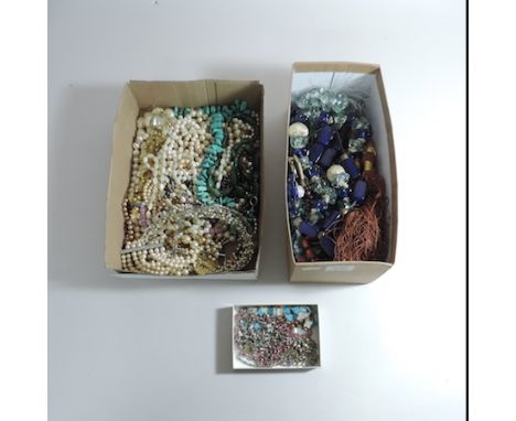 Two boxes of costume jewellery, to include bead and pearl necklaces