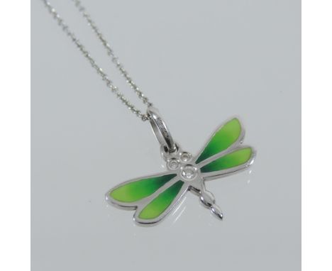 A Tiffany and Co. silver and enamel dragonfly pendant, on a fine chain, boxed with receipt