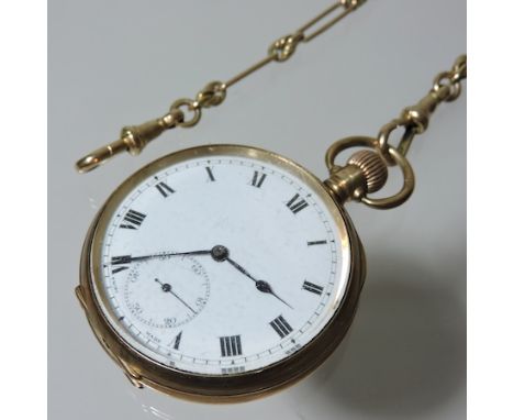 A Victorian 9 carat gold open faced pocket watch, with a white enamel dial, engraved with a monogram, on a 9 carat gold chain