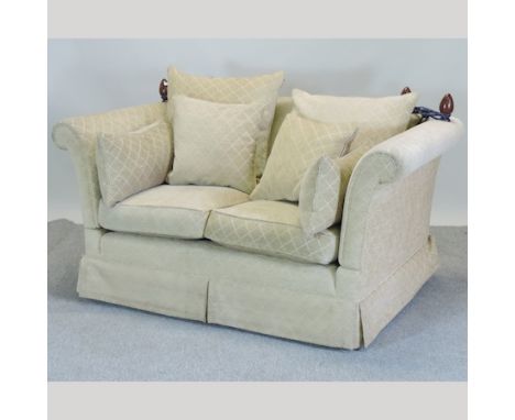 A gold upholstered knole two seater sofa, approx. 153cm