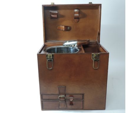 A contemporary brown leather champagne hamper, with fitted interior, 34cm tall