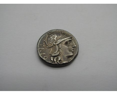 Roman Republic Silver Denarius, CN Lucretius Trio, 136 BC, OBV: Helmeted Hd. of Roma, r., x below chin, Trio behind. Rev: Dis