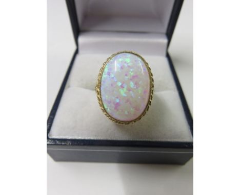 OPAL RING, 9ct yellow gold opal ring set a large oval opal, size N/O