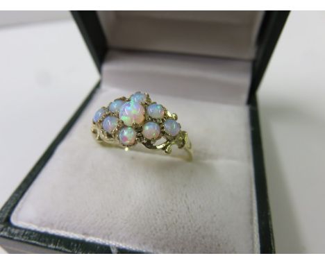 OPAL CLUSTER RING, 9ct yellow gold ring set a cluster of 9 opals, size N/O