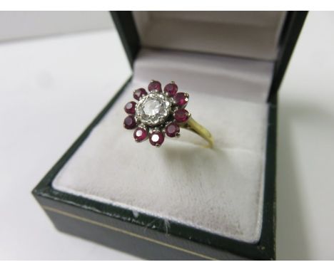 RUBY & DIAMOND CLUSTER RING, 18ct yellow gold ring set a 0.5 ct cluster of diamonds to centre surrounded by 10 rubies, size K