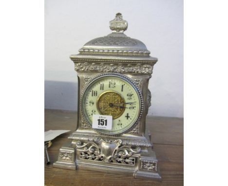 EDWARDIAN BRACKET CLOCK, ornate silver plate casing with mythological mask side panels and French movement with key, 10" high