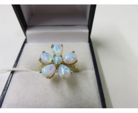 OPAL "DAISY" RING, 9ct yellow gold ring set a cluster of opals of daisy form, size P/Q