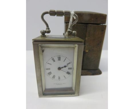 MINIATURE CARRIAGE CLOCK, a silver plate carriage clock by Pridham & Sons of Torquay in travelling case 