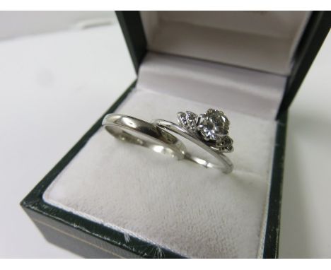 WEDDING RING SET, platinum ring set, solitaire diamond ring approximately 1/3ct together with a platinum wedding band, size J