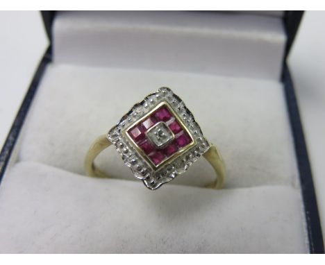 RUBY & DIAMOND RING, lozenge form ring set central diamond surrounded by rubies and further diamonds on yellow gold band, siz