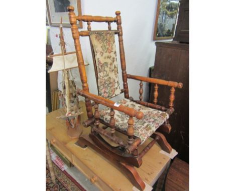 AMERICAN ROCKING ARMCHAIR, a miniature version of typical bobbin framed rocking armchair