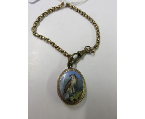 PINCH BECK LOCKET, oval pinch beck picture locket with enamel decoration of a bird of prey on a antique bracelet strap