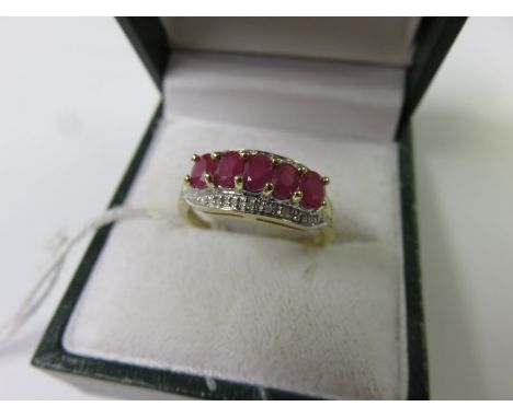 RUBY & DIAMOND RING, 9ct yellow gold ring set central band of 5 rubies with diamond chips to the outer, size L