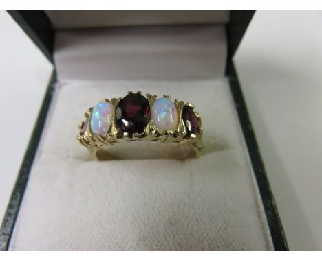 OPAL & GARNET RING, 9ct yellow gold 5 stone ring set 3 garnets & 2 opals, size N