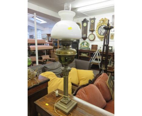 OIL LAMP, brass square base column support oil lamp, converted to electricity with milk glass shade