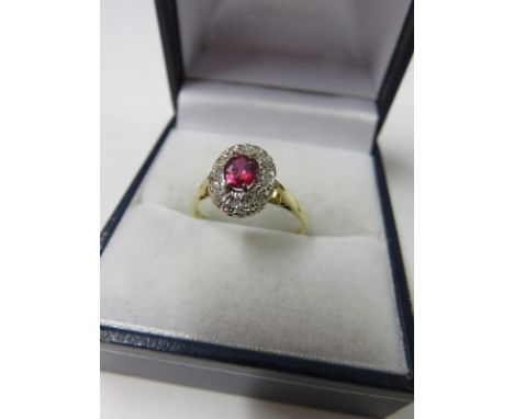 RUBY & DIAMOND RING, 18ct yellow gold set a ruby and diamond cluster, size L/M
