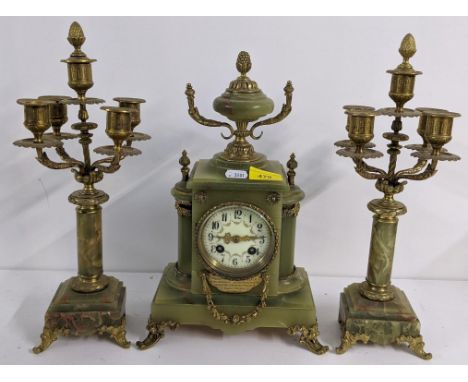 An Edwardian green onyx mantle clock with applied gilt metal mounts and engraved plaque, Samuel Marti movement striking on a 